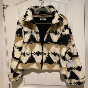 NWT! O’Neill sherpa zip up. Neutral colors/ Staple layer to have!